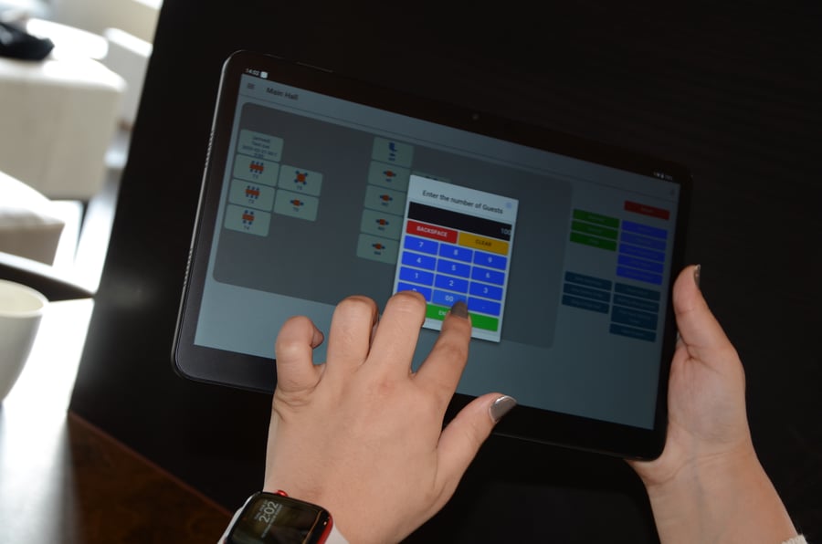 Guest using mobile order at table