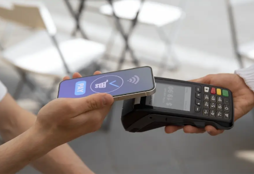 Contactless payment terminal at restaurant table